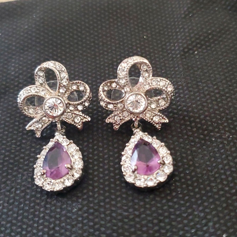 JTV TITANIC COLLECTABLE SWAROVSKI WHITE AND PURPLE CRYSTAL EARRINGS.